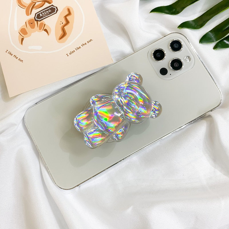 Phone Pop Socket Holographic Bear. Griptok. Attach it to your phone so you can hold it securely, prop it up whilst watching shows, or just fiddle around with it. Compatible with any phone!