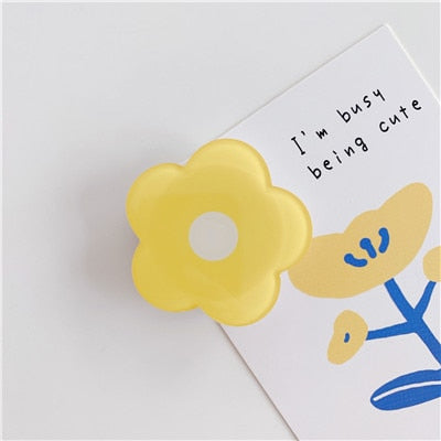 Cartoon Flower Phone Socket. Attach these to your phone so you can hold it securely, prop it up whilst watching shows, or just fiddle around with it. Compatible with any phone!