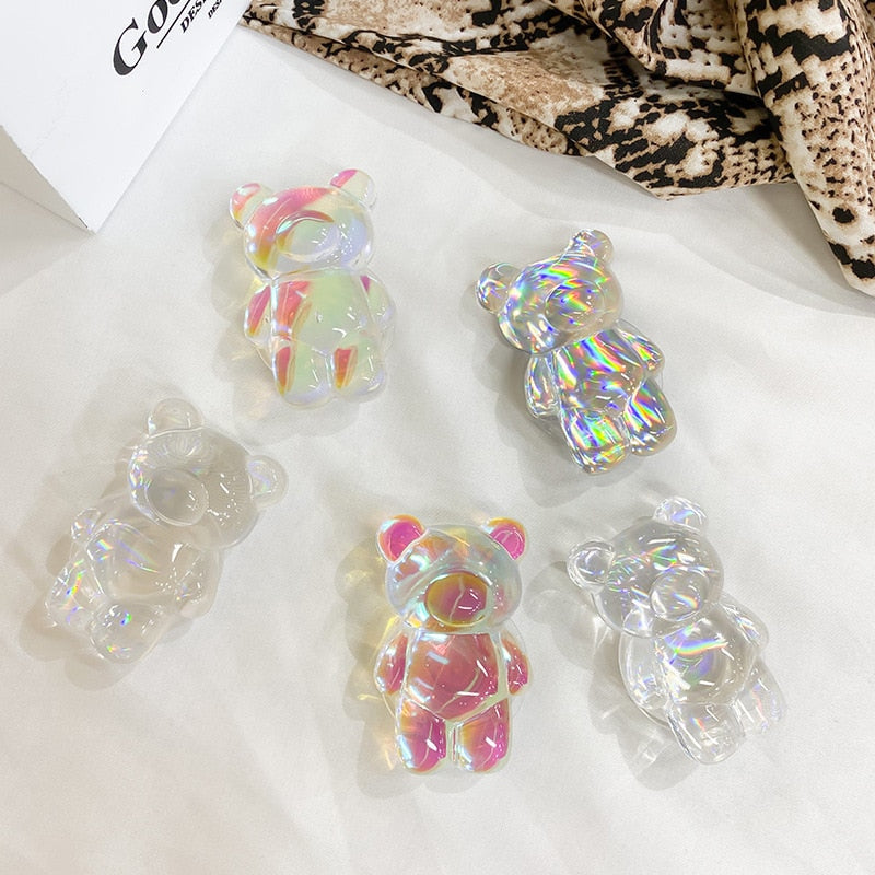Phone Pop Socket Clear Bear. Griptok. Attach it to your phone so you can hold it securely, prop it up whilst watching shows, or just fiddle around with it. Compatible with any phone!