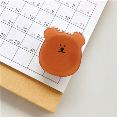 Cartoon Bear Phone Socket. Attach these to your phone so you can hold it securely, prop it up whilst watching shows, or just fiddle around with it. Compatible with any phone!