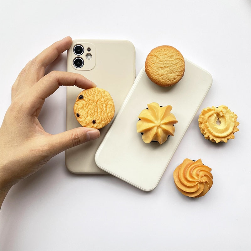 Phone Socket Danish Butter Cookies. Griptok. Attach it to your phone so you can hold it securely, prop it up whilst watching shows, or just fiddle around with it. Compatible with any phone!