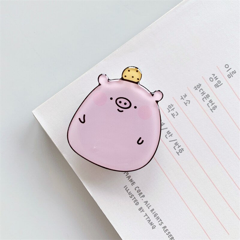 Pig Cartoon Phone Socket. Griptok. Attach it to your phone so you can hold it securely, prop it up whilst watching shows, or just fiddle around with it. Compatible with any phone!