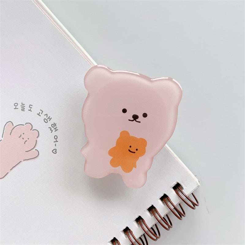Bear and bear Cartoon Phone Socket. Griptok. Attach it to your phone so you can hold it securely, prop it up whilst watching shows, or just fiddle around with it. Compatible with any phone!