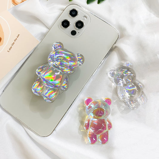 Phone Pop Socket Bear. Attach it to your phone so you can hold it securely, prop it up whilst watching shows, or just fiddle around with it. Compatible with any phone!