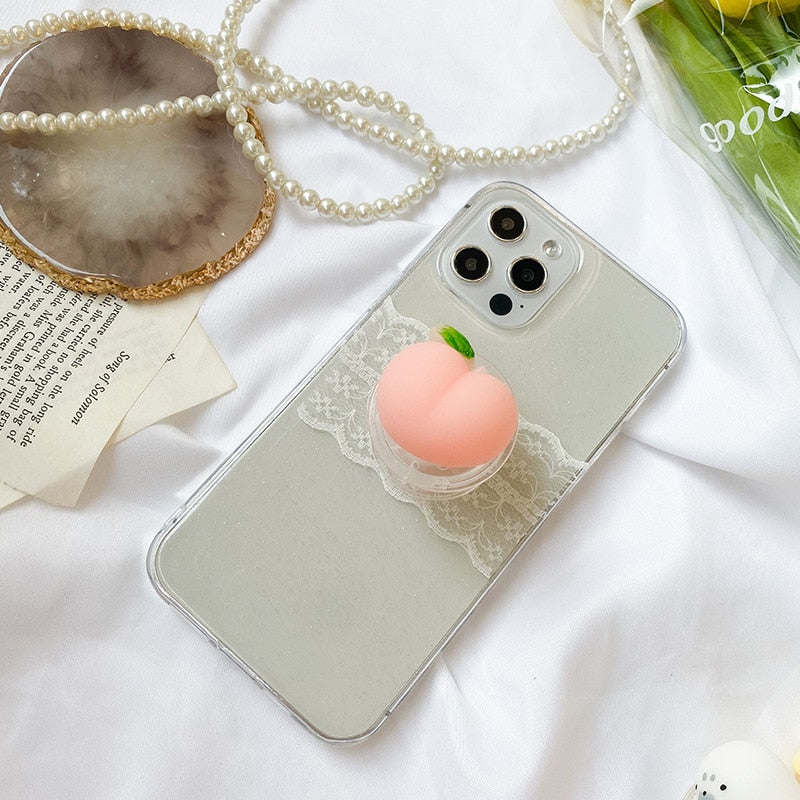Chonky Peach Phone Socket. Griptok. Attach it to your phone so you can hold it securely, prop it up whilst watching shows, or just fiddle around with it. Compatible with any phone!