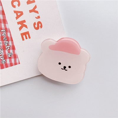 Cartoon Bear Phone Socket. Attach these to your phone so you can hold it securely, prop it up whilst watching shows, or just fiddle around with it.  Compatible with any phone!
