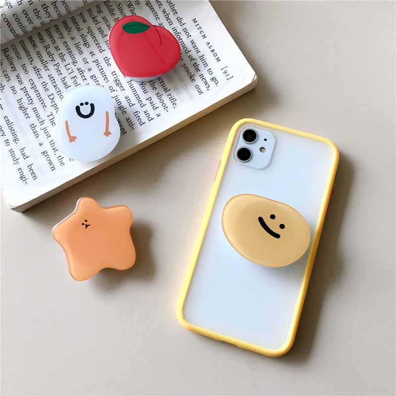 Cartoon Potato Phone Socket. Attach these to your phone so you can hold it securely, prop it up whilst watching shows, or just fiddle around with it.  Compatible with any phone!