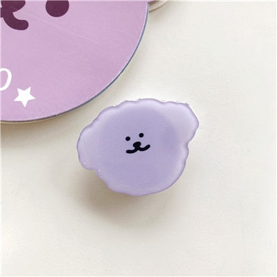 Cartoon Purple Dog Phone Socket. Attach these to your phone so you can hold it securely, prop it up whilst watching shows, or just fiddle around with it.  Compatible with any phone!