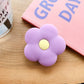 Cartoon Flower Phone Socket. Attach these to your phone so you can hold it securely, prop it up whilst watching shows, or just fiddle around with it.  Compatible with any phone!