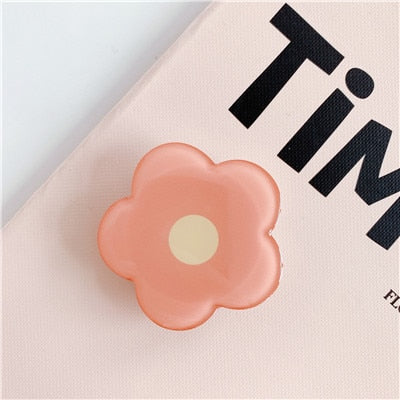 Cartoon Flower Phone Socket. Attach these to your phone so you can hold it securely, prop it up whilst watching shows, or just fiddle around with it.  Compatible with any phone!