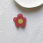 Cartoon Flower Phone Socket. Attach these to your phone so you can hold it securely, prop it up whilst watching shows, or just fiddle around with it.  Compatible with any phone!