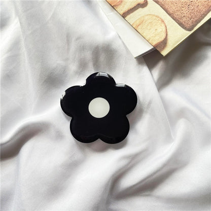 Cartoon Flower  Phone Socket. Attach these to your phone so you can hold it securely, prop it up whilst watching shows, or just fiddle around with it.  Compatible with any phone!