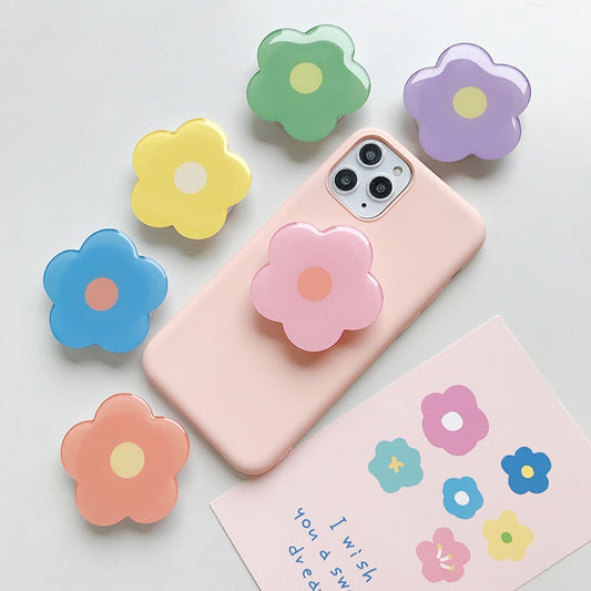 Cartoon Flower  Phone Socket. Attach these to your phone so you can hold it securely, prop it up whilst watching shows, or just fiddle around with it.  Compatible with any phone!