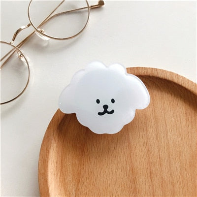 Cartoon Dog Phone Socket. Attach these to your phone so you can hold it securely, prop it up whilst watching shows, or just fiddle around with it.  Compatible with any phone!