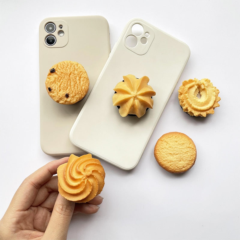 Phone Socket Danish Butter Cookies. Griptok. Attach it to your phone so you can hold it securely, prop it up whilst watching shows, or just fiddle around with it. Compatible with any phone!
