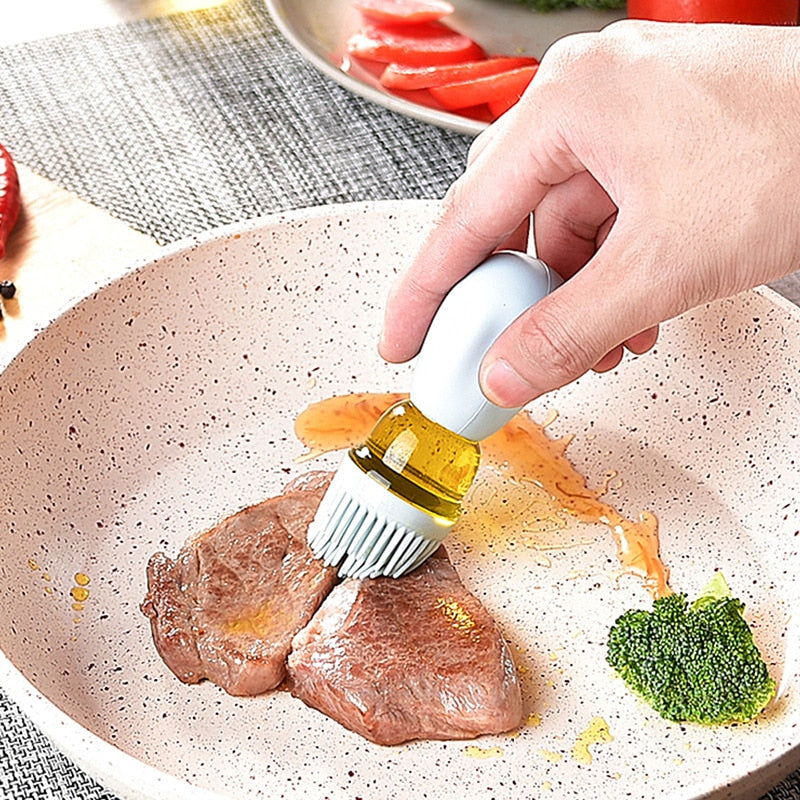 Oil Baster and Dispenser, basting brush with base. Used on steak.