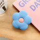 Cartoon Flower Phone Socket. Attach these to your phone so you can hold it securely, prop it up whilst watching shows, or just fiddle around with it.  Compatible with any phone!