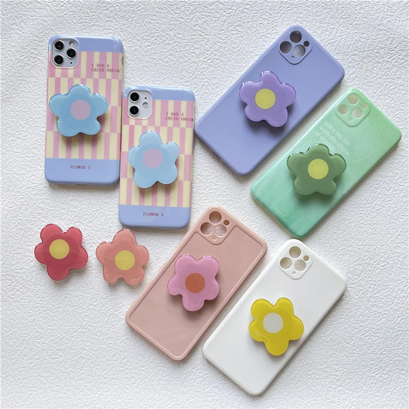 Cartoon Flower Phone Socket. Attach these to your phone so you can hold it securely, prop it up whilst watching shows, or just fiddle around with it.  Compatible with any phone!