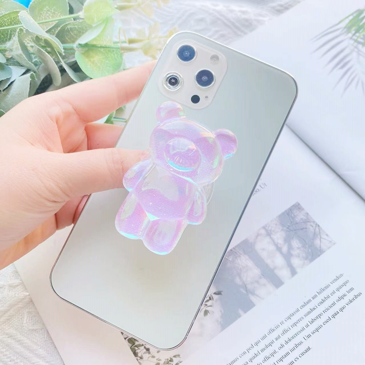 Pink Phone Pop Socket Bear. Attach it to your phone so you can hold it securely, prop it up whilst watching shows, or just fiddle around with it. Compatible with any phone!