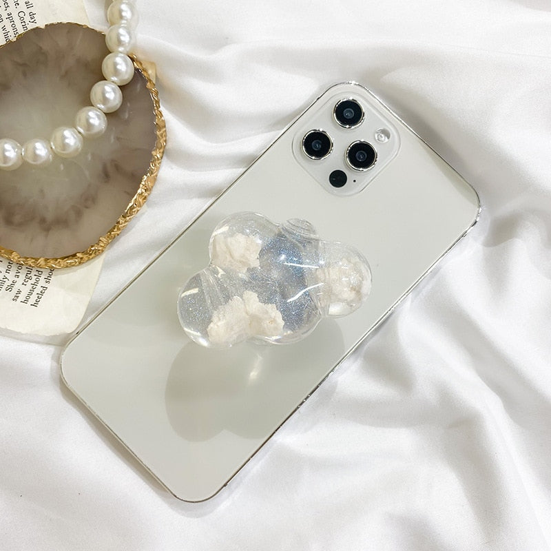 Holographic Clouds Phone Socket. Attach these to your phone so you can hold it securely, prop it up whilst watching shows, or just fiddle around with it.  Compatible with any phone!